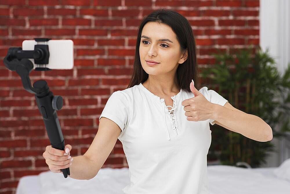 Young female recording live home