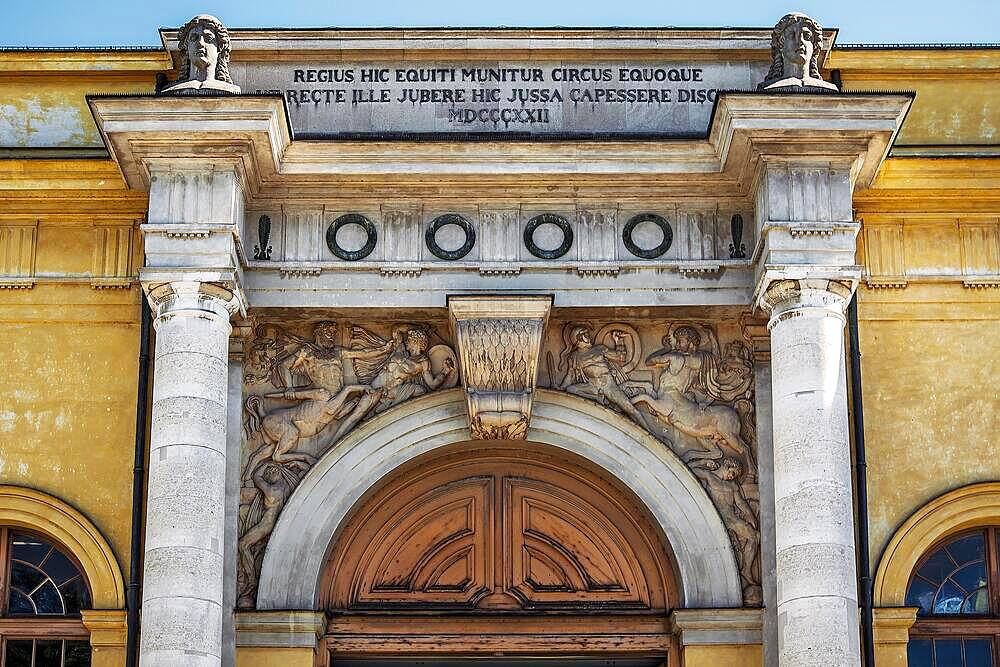 Marstall, entrance gate with relief, Battle of the Centaurs and Lapiths, crowned with busts of Castor and Pollux, Marstallplatz, Munich, Upper Bavaria, Bavaria, Germany, Europe