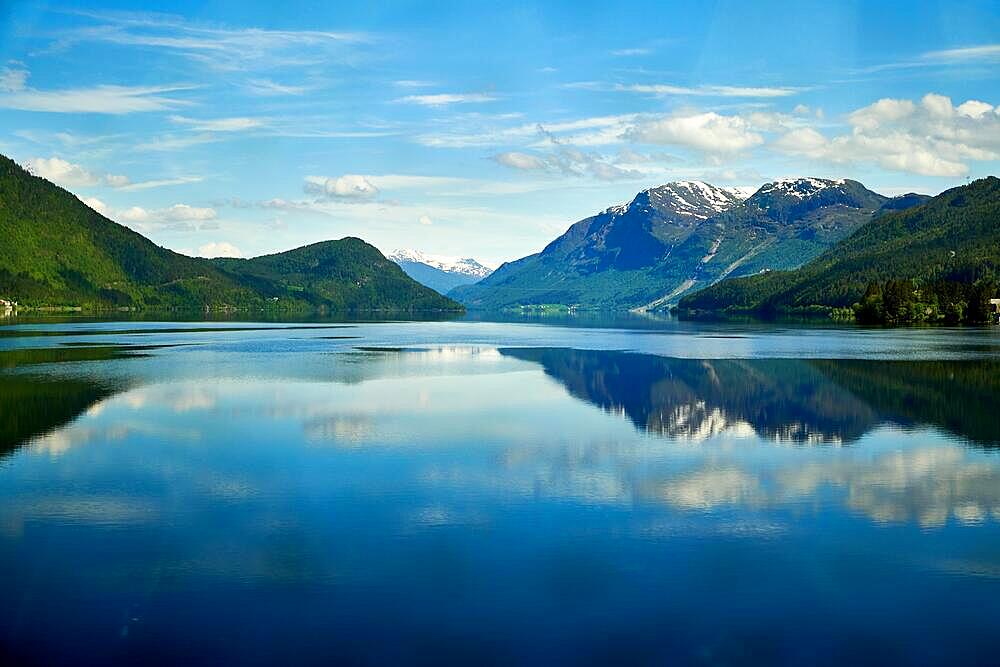 Travelling norwegian fjord nature by cruise ship