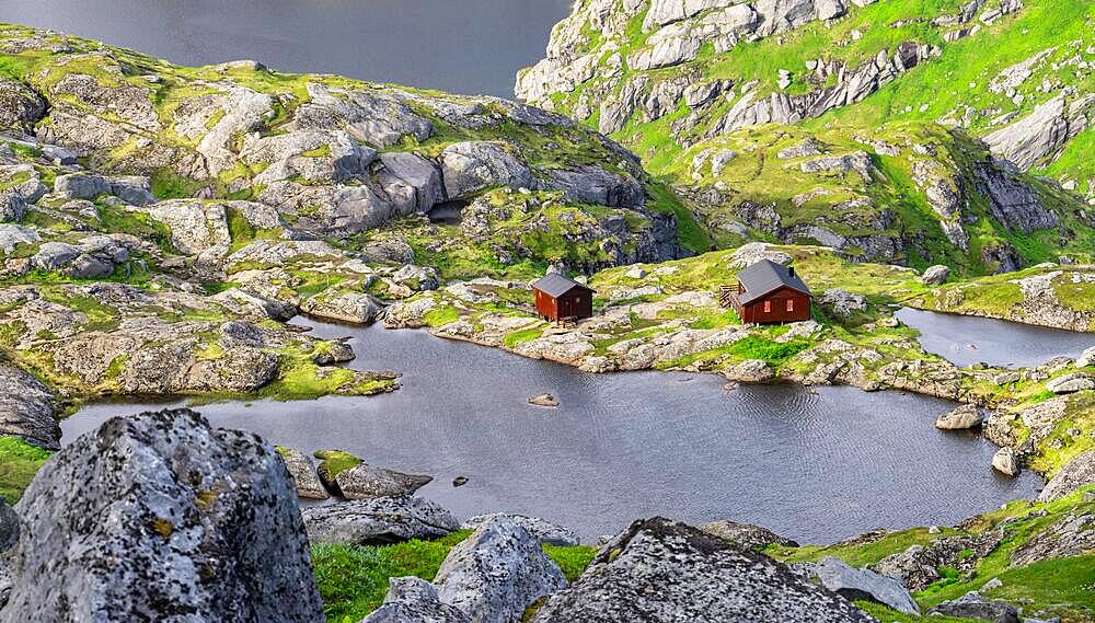 Mountain landscape with Munkebu mountain hut and small lakes, view from the ascent to Munken, Moskenesoya, Lofoten, Nordland, Norway, Europe