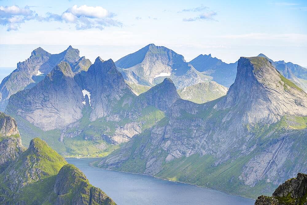 Mountain landscape with steep rocky peaks fjords and sea, view from the top of Munken to Reinefjorden, Moskenesoya, Lofoten, Nordland, Norway, Europe