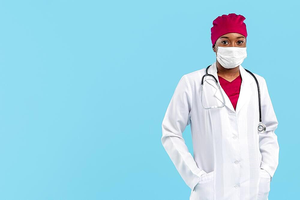 Specialist female doctor wearing white robe