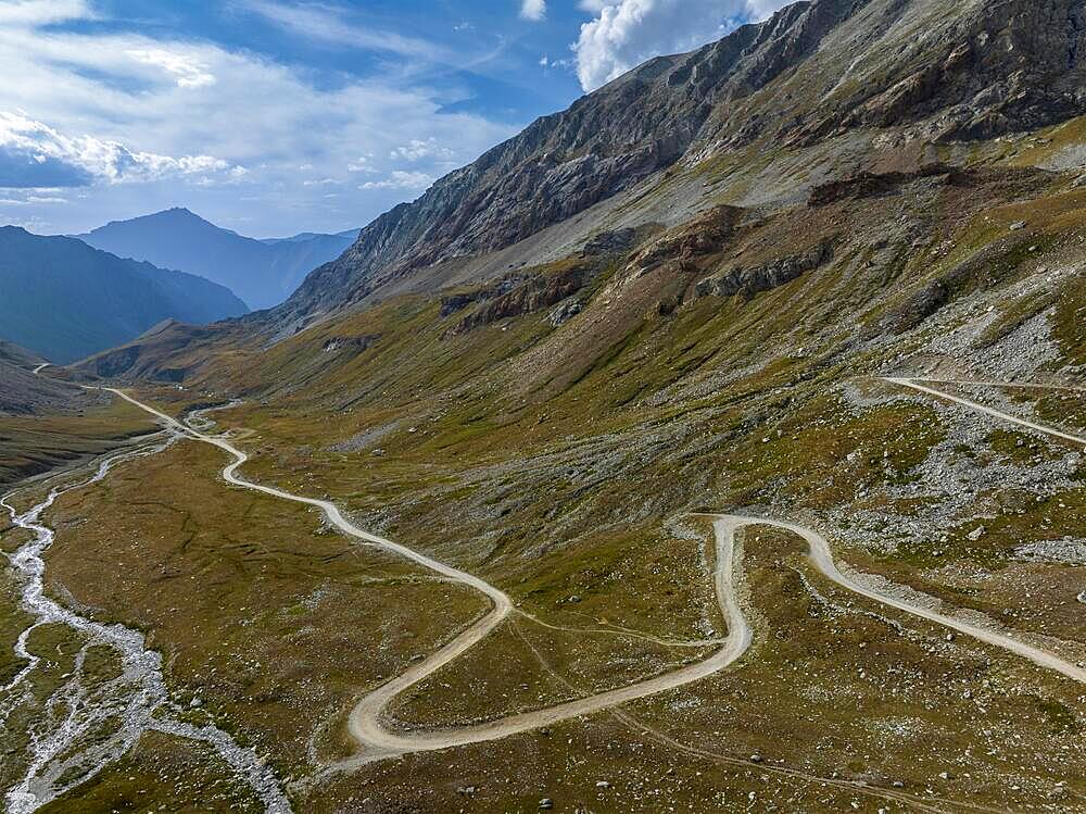 Ascent to Colle Sommeiller, also Col du Sommeiller, Mont-Cenis massif, Rough gravel road in the Piedmont Alps, Italian-French border area, Bardonecchia, Piedmont, Italy, Europe