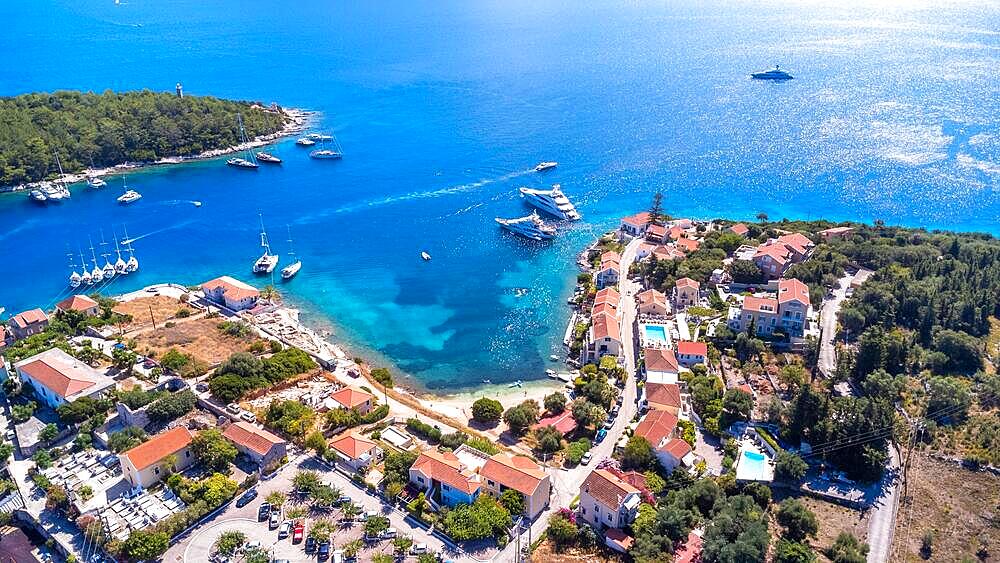 Aerial summer view of Fiskardo village harbor on Kefalonia island, Greece, Europe