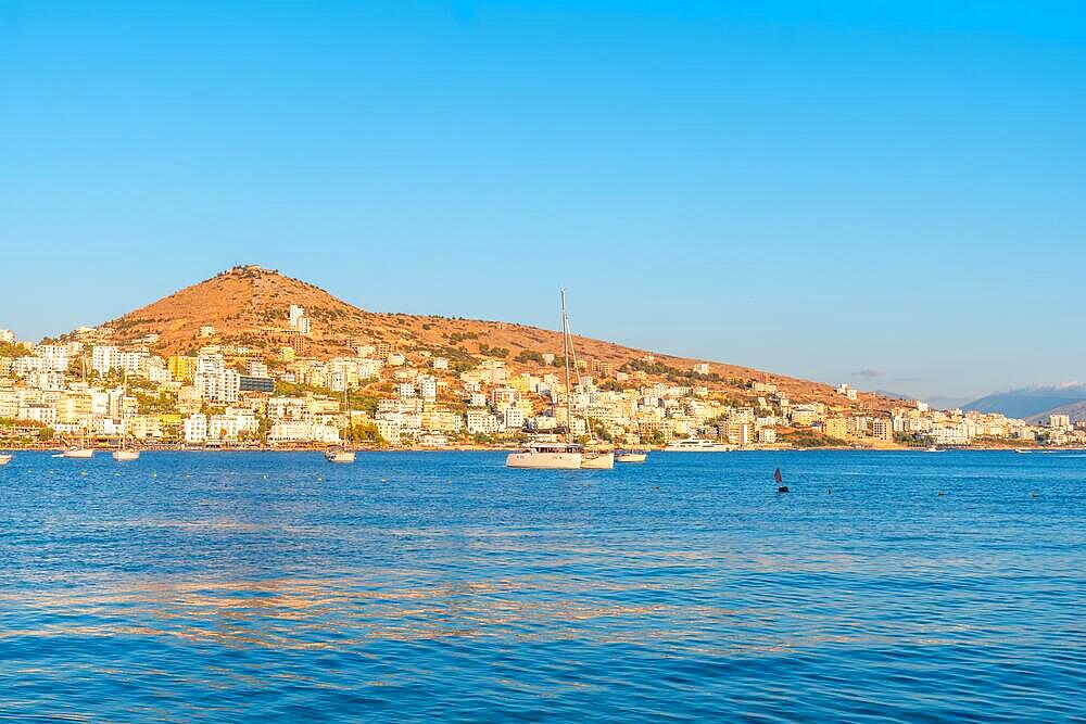 Panoramic view of the beach and the city from Saranda Beach on the Albanian Riviera in Sarande, Albania, Europe