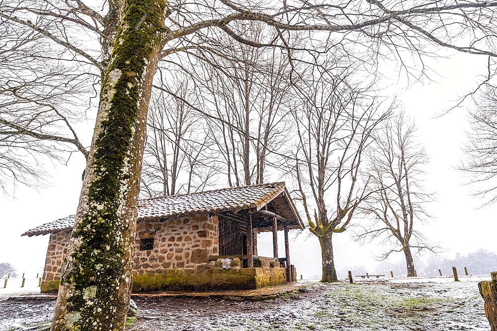 Refuge of mount aizkorri in gipuzkoa. Snowy landscape by winter snows. Basque Country, Spain, Europe