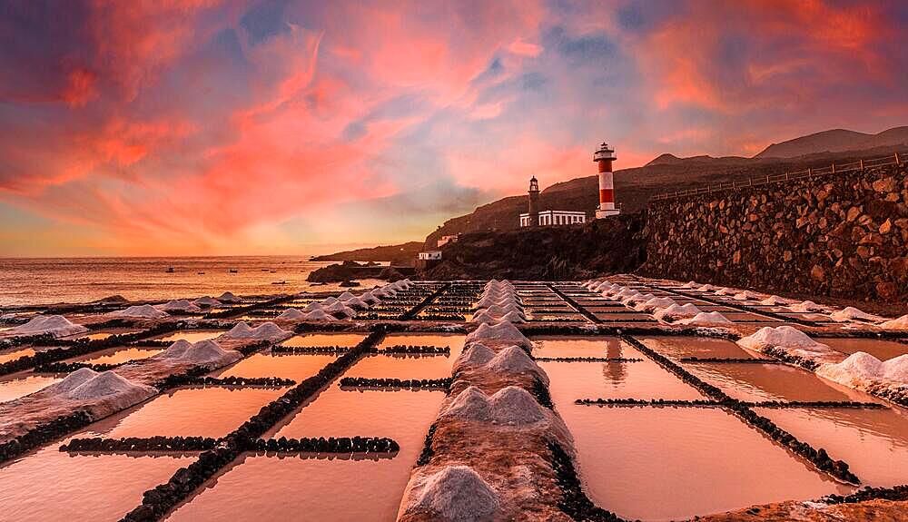 Sunset at the Fuencaliente Lighthouse next to the salt flats, on the route of the volcanoes south of the island of La Palma, Canary Islands, Spain, Europe