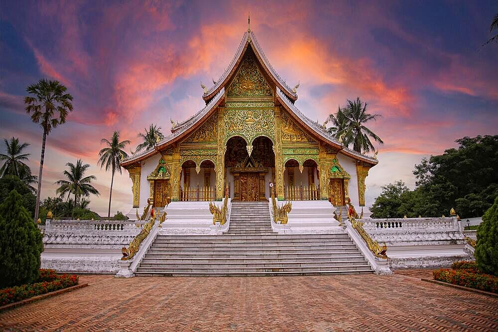 Lovely sunset at a lovely temple in Luang Prabang in summer, Laos, Asia