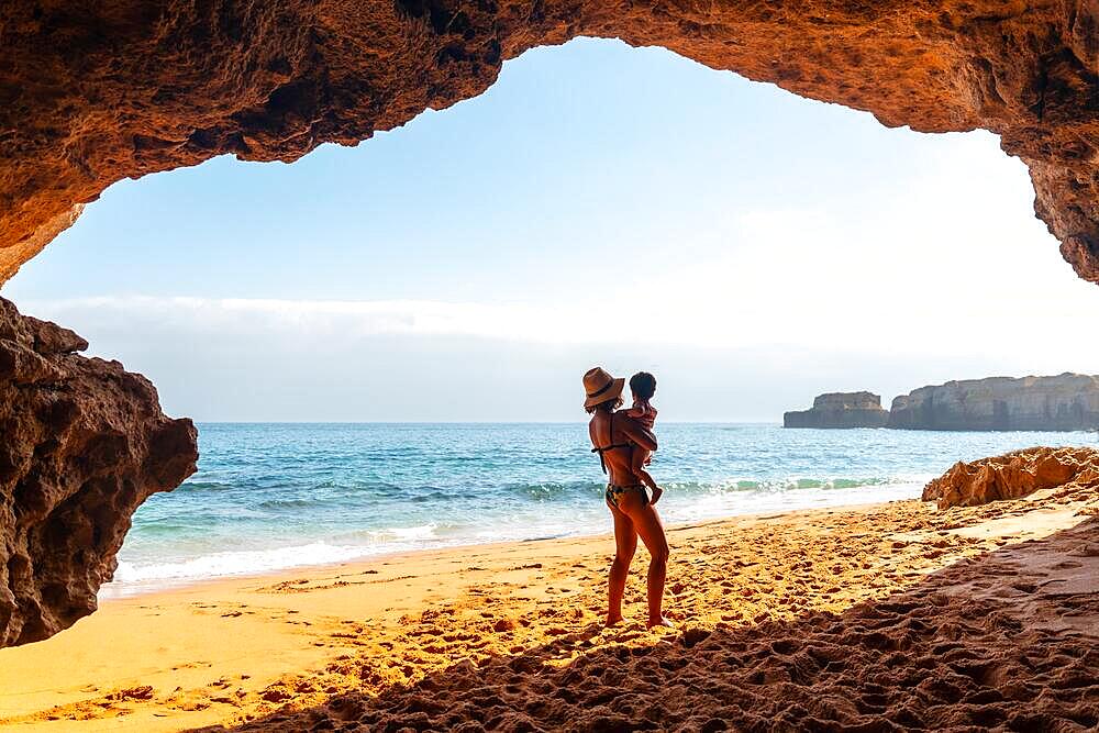 With the son in the natural beach cave in the Algarve at Praia da Coelha, Albufeira. Portugal