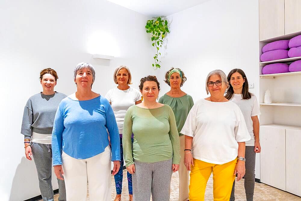 Portrait of a group of mature women attending Qi gong class