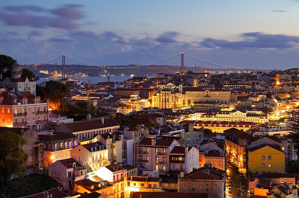 View from the viewpoint Miradouro da Graça, also Sophia de Mello Breyner Andresen, city view, old town, bridge 25 de Abril, river Tejo, Lisbon, evening mood, twilight, blue hour, Portugal, Europe