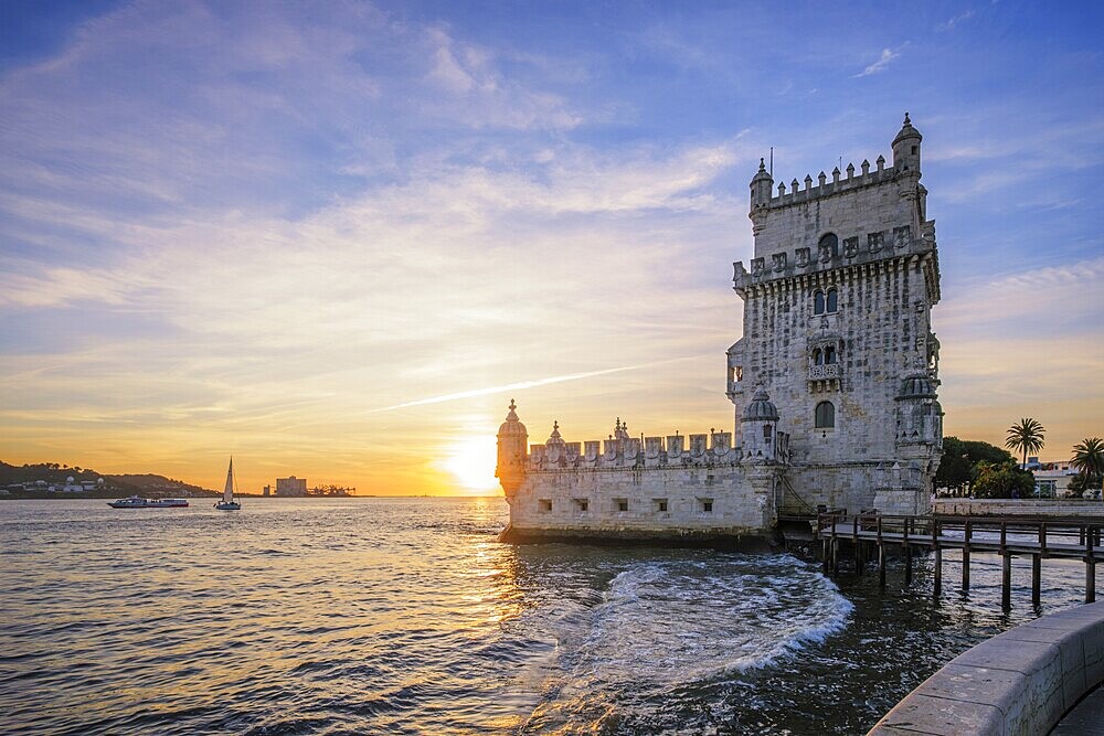 Belem Tower or Tower of St Vincent, famous tourist landmark of Lisboa and tourism attraction, on the bank of the Tagus River Tejo on sunset. Lisbon, Portugal, Europe