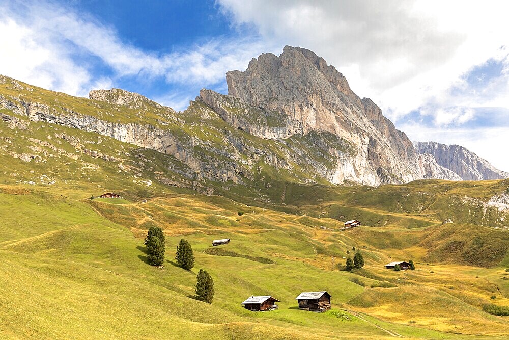 Huts on the Seceda under the Geisler peaks, Val Gardena, South Tyrol