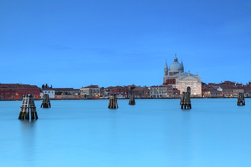 View of Chiesa del Santissimo Redentore from Punta della Dogana in Venice in the morning light