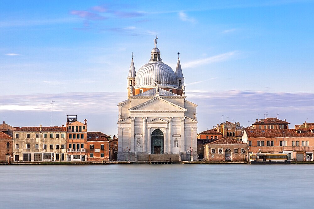 View of Chiesa del Santissimo Redentore from Punta della Dogana in Venice in the morning light