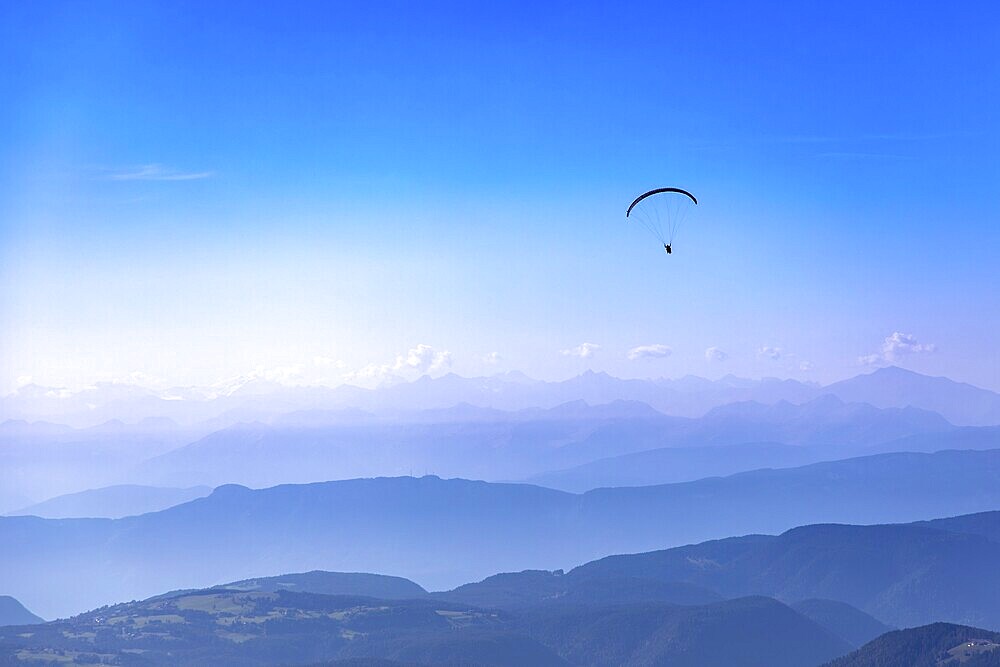 Paragliding over the Alps in the Dolomites, South Tyrol