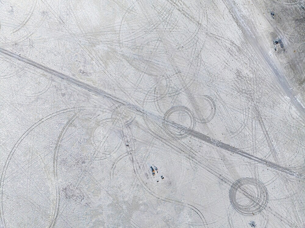 Tyre tracks in the salt pan, top-down, aerial view, Kubu Island, Botswana, Africa