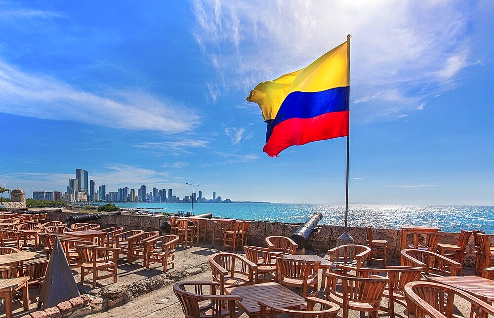 Street cafe in colonial Cartagena Walled City (Cuidad Amurrallada) overlooking scenic shoreline of Bocagrande and hotel zone