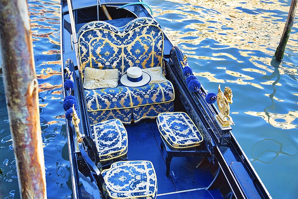 Luxury Gondola waiting for tourists near famous Rialto Bridge in Venice