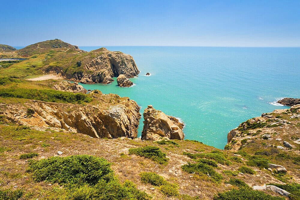 A typical set of dramatic high cliffs line the edge of Juguang island on the Matsu islands in Taiwan