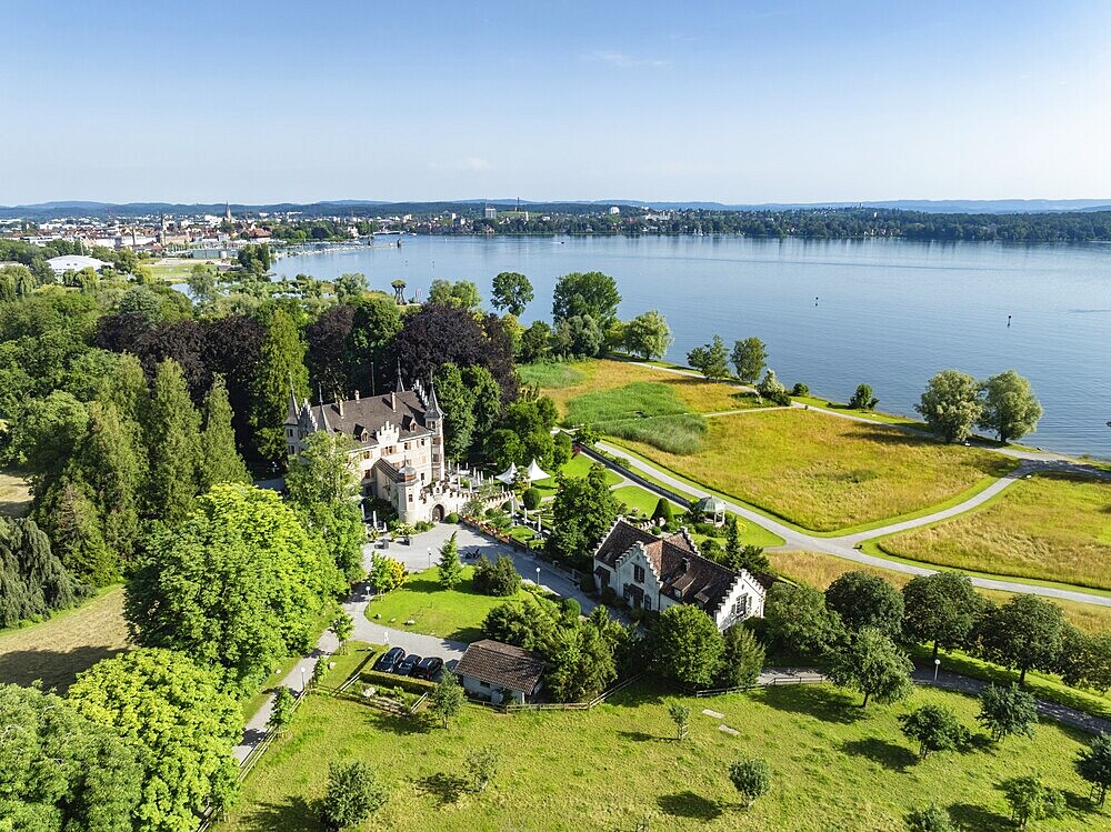 Aerial view of Seeburg Castle with integrated catering and event location in Seeburg Park on the Swiss shore of Lake Constance, on the horizon the city of Constance, Kreuzlingen, Canton Thurgau, Switzerland, Europe