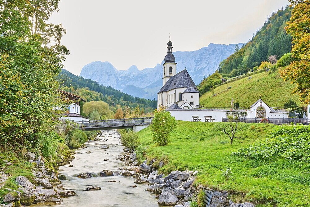 Church St. Sebastian in Ramsau, Ramsauer Ache River in autumn, Idyllic village, Berchtesgadener Land, Bavaria, Germany, Europe