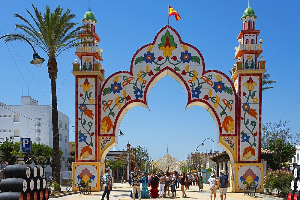 Decorative Tor tor with floral motifs and a crowd of people below, festive ambience, Feria de la Manzanilla, Feria de Sanlúcar, Sanlúcar de Barrameda, Sanlucar, Cádiz, Cadiz, Andalusia, Spain, Europe