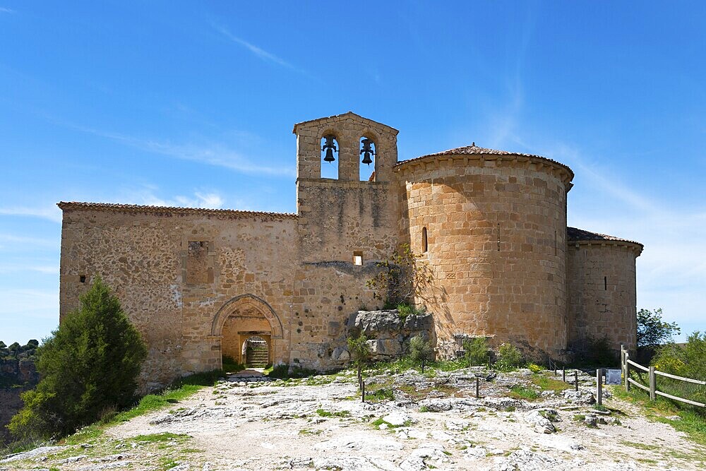 Lonely medieval church with stone walls and bell tower under a clear blue sky, Ermita de San Frutos, Natural Park of the Gorges of the Duratón River, Duraton, Parque Natural de las Hoces del Río Duratón, Sepulveda, Segovia, Valladolid, Castilla y León, Spain, Europe