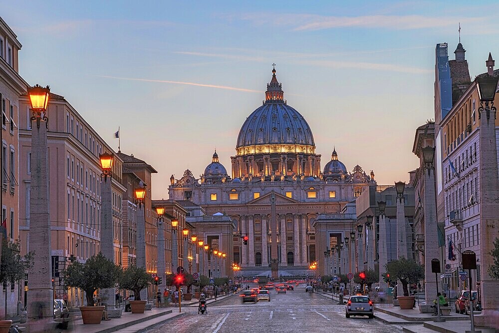 Sunset over St. Peter's Basilica in the Vatican. Evening at the most famous landmark, cloudy sky