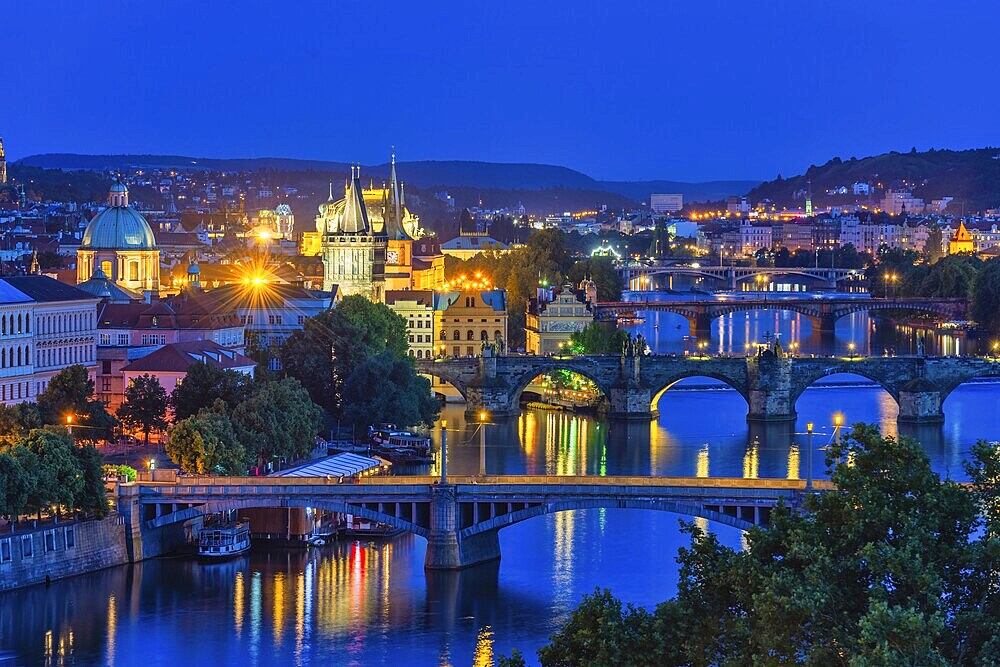 Prague Czech Republic, high angle view night city skyline at Charles Bridge and Vltava River, Czechia