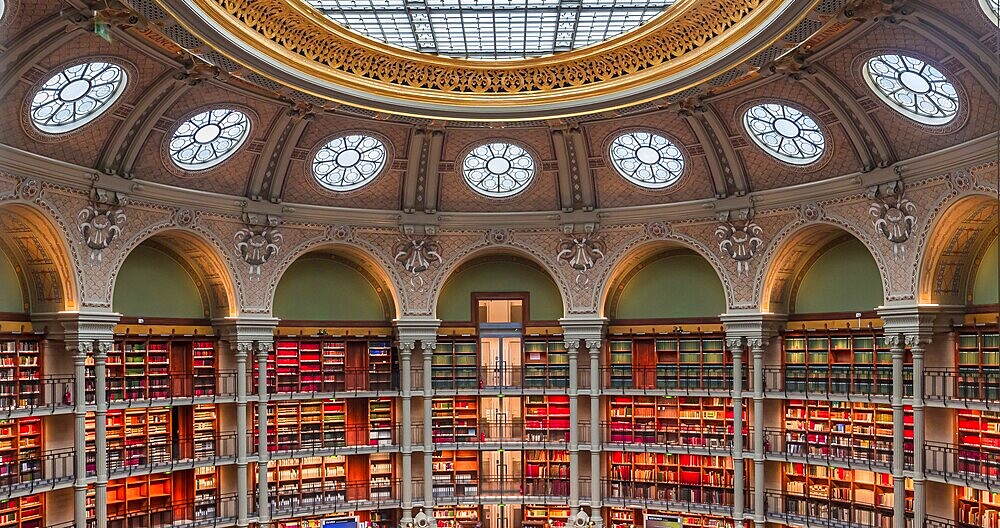 PARIS, FRANCE, OCTOBER 20, 2022 : Oval reading room in National Library, Richelieu site, Paris, france, built by architects Jean-Louis Pascal. and Alfred Recoura, from year 1897 to year 1932