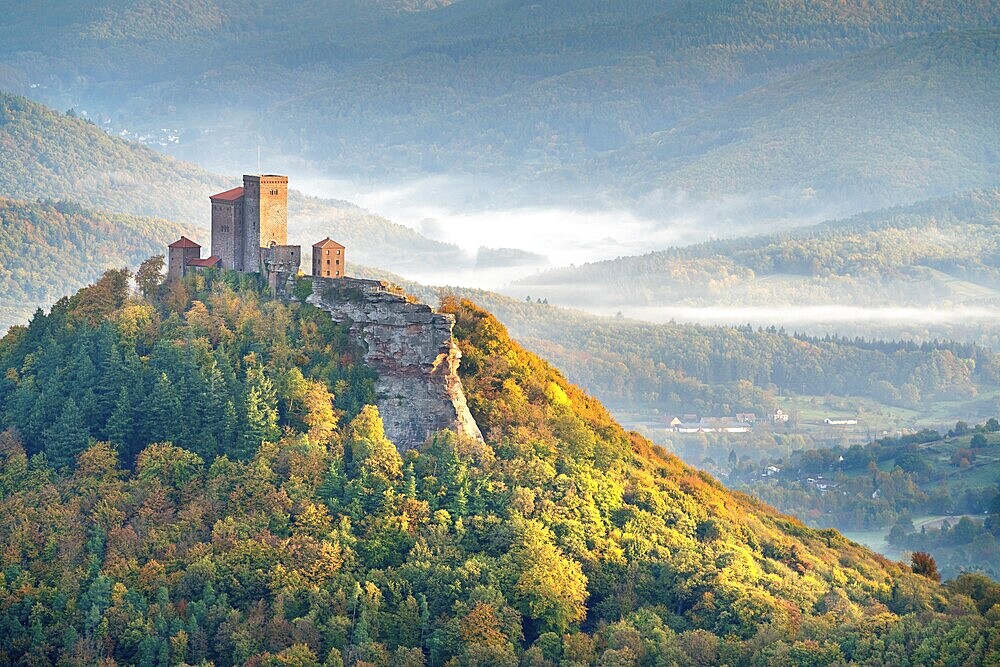 Trifels Castle in the morning light with wafts of mist in the valley, autumn, Annweiler at Trifels, Palatinate Forest, Rhineland-Palatinate, Palatinate, Germany, Europe
