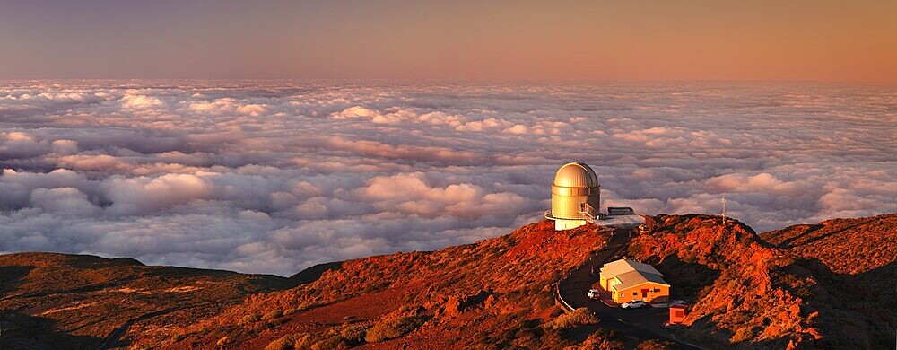 Observatory on the Roque de los Muchachos with clouds at sunset, Caldera de Taburiente National Park, La Palma, Canary Islands, Spain, Europe