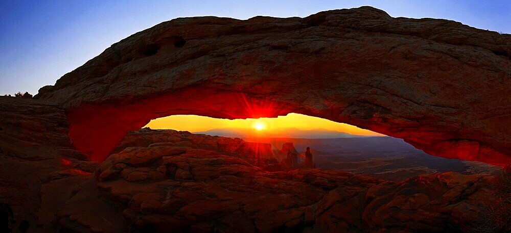 Sunrise at Mesa Arch stone arch, Canyonlands National Park, near Moab, Utah, United States, North America