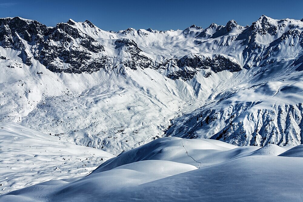 Ski mountaineers in winter landscape with Vorarlberger mountains in the background, Sankt Antönien, Prättigau, Graubünden, Switzerland, Europe