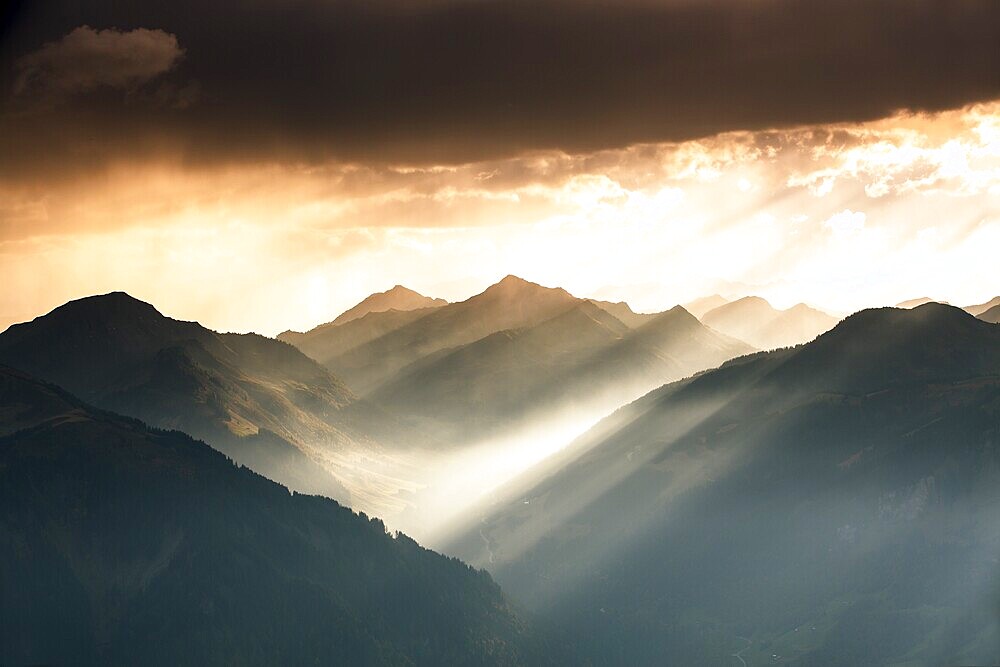Landscape with sunbeams on the Diedamskopf with view towards Kanisfluh and Damuls, Bregenz Forest, Austria, Europe