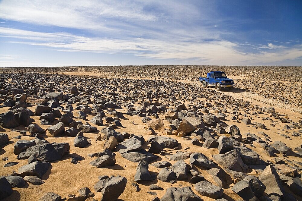 Car track in stone desert, Akakus Mountains, Libya, Sahara, North Africa, Africa