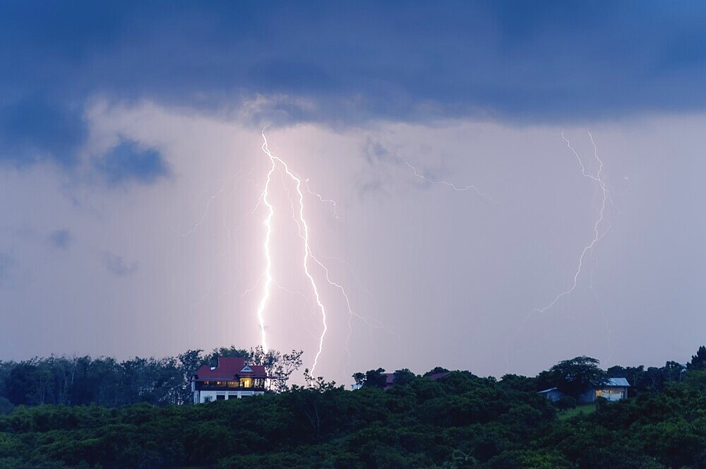 Lightning striking next to a house, Ban Lung, Cambodia, Southeast Asia, Asia