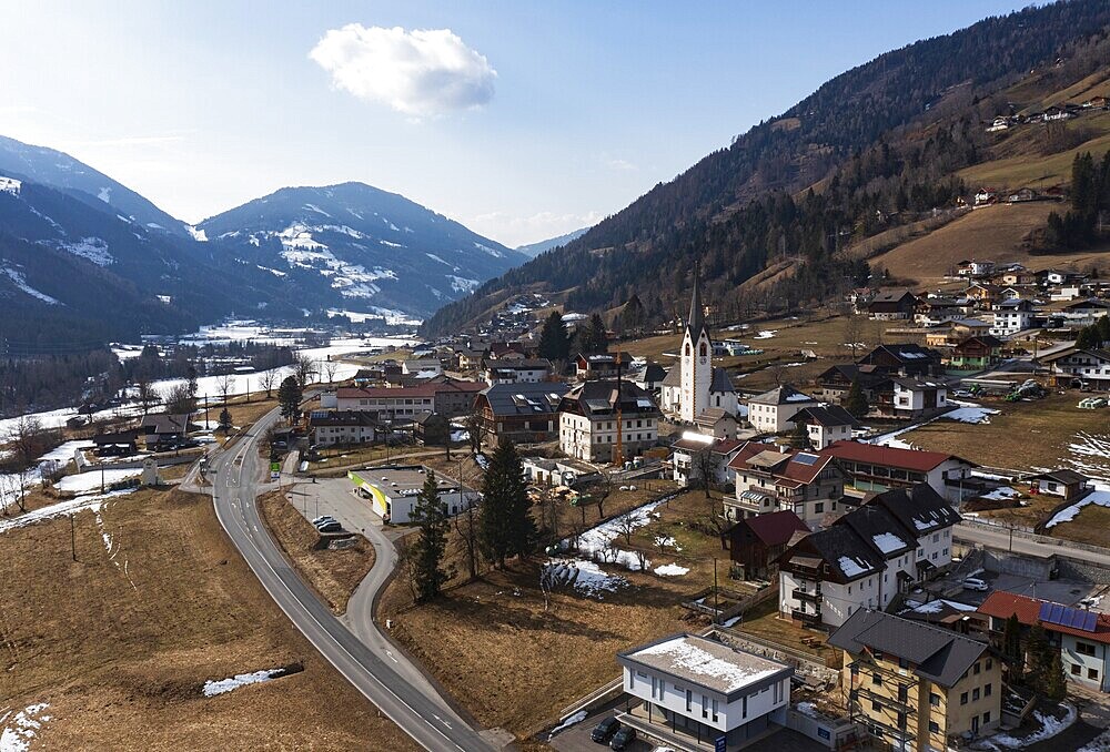 Drone shot, view of village with parish church, Rangersdorf, Mölltal, Carinthia, Austria, Europe