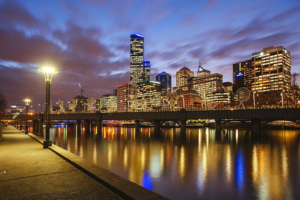 Melbourne, Australia, July 2 2013: Melbourne skyline along the Yarra River at dusk in Victoria Australia, Oceania