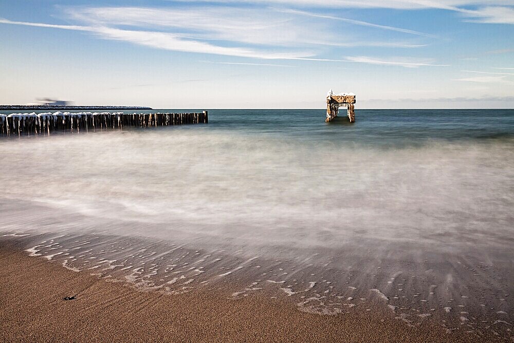 Groyne and jetty remains on the coast of the Baltic Sea