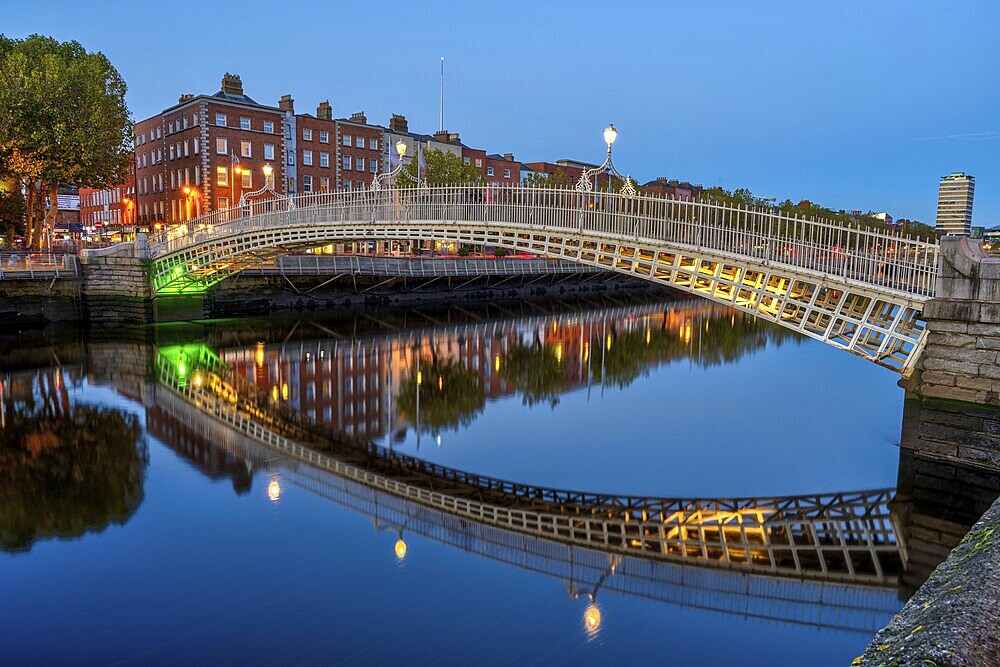 The famous Ha'penny Bridge in Dublin, Ireland, at night, Europe