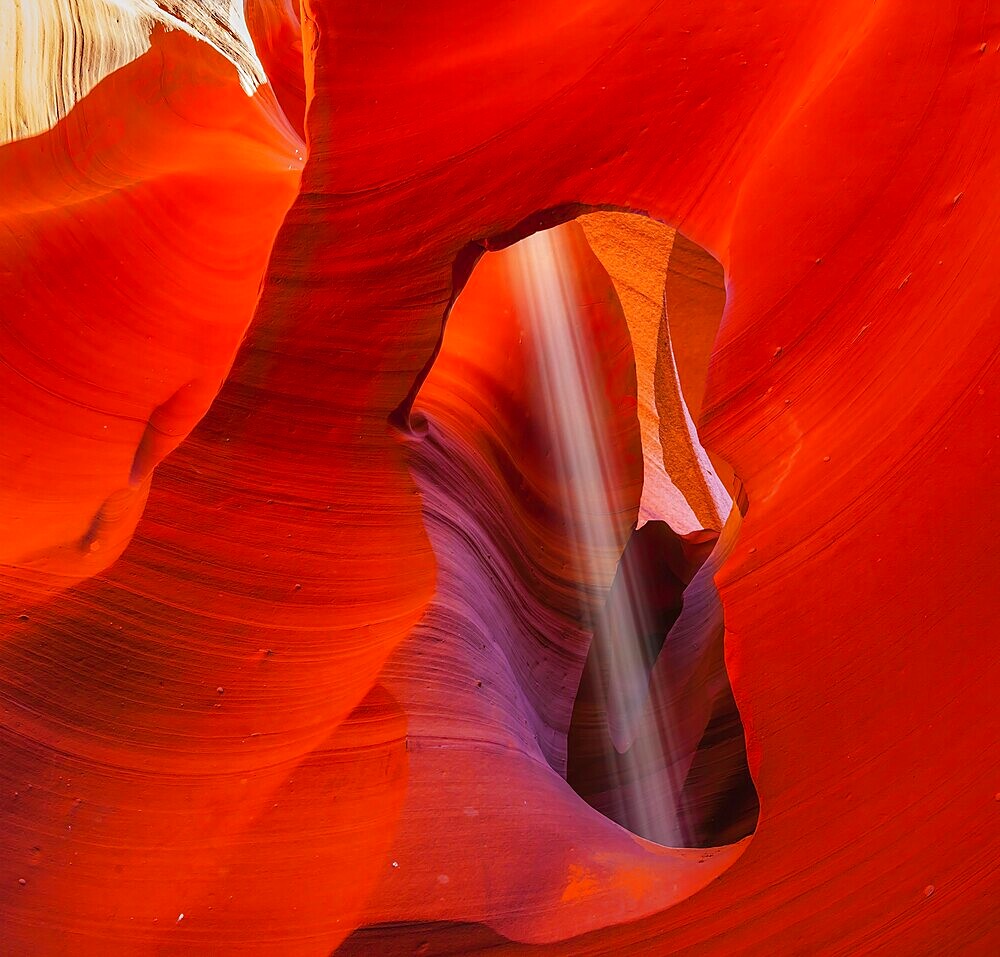 Famous midday sun ray in slot canyon Antelope. The Navajo reservation in Arizona, USA, North America