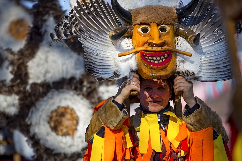 Pernik, Bulgaria - 28 January 2018: Participants take part in the International Festival of Masquerade Games Surva. The festival promotes variations of ancient Bulgarian and foreign customs and masks