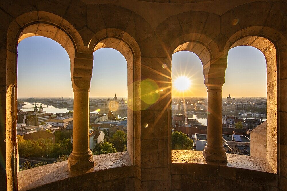Old historic fortress and church at sunrise. City panorama at dusk. View of the Danube Fishermen's Bastion, Halászbástya, Budapest, Hungary, Europe