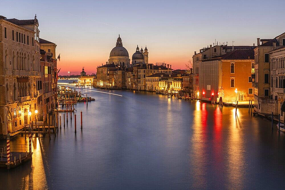 Morning atmosphere in front of sunrise, view of the Grand Canal from the Ponte dell' Accademia, Basilica Maria della Salute in the background, long exposure, Venice, Italy, Europe