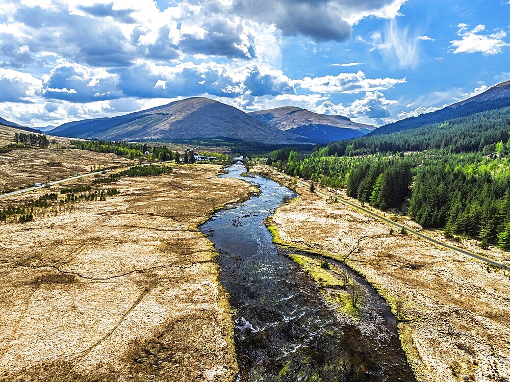 Mountains and Moors over Loch Tulla and River Orchy from a drone, Highlands, Scotland, UK