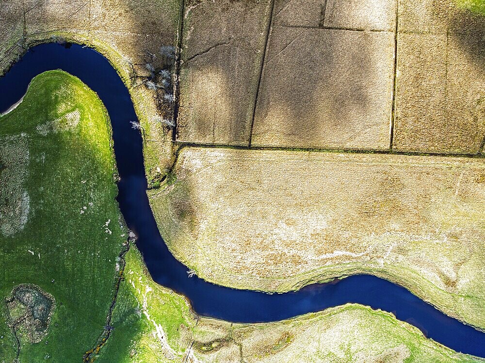 Top Down over Farms and River Dochart and Road A85 from a drone, Perthshire, Scotland, UK