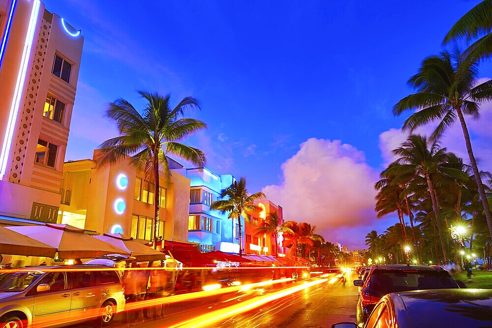 Miami Beach South Beach sunset in Ocean Drive Florida Art Deco and car lights