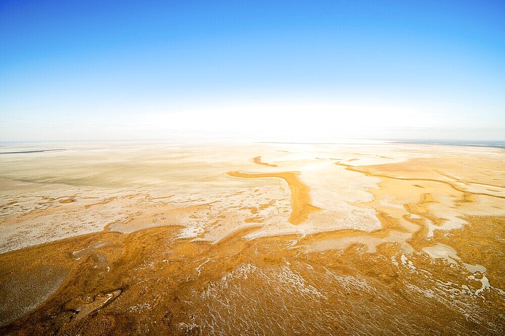Salt flats, Etosha (Great White Place in the Ovambo language), sky, Etosha National Park, Namibia